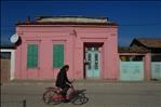 cyclist and pink house,muradiye,manisa