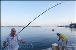 catching gilt head bream from  izmir bay at dawn